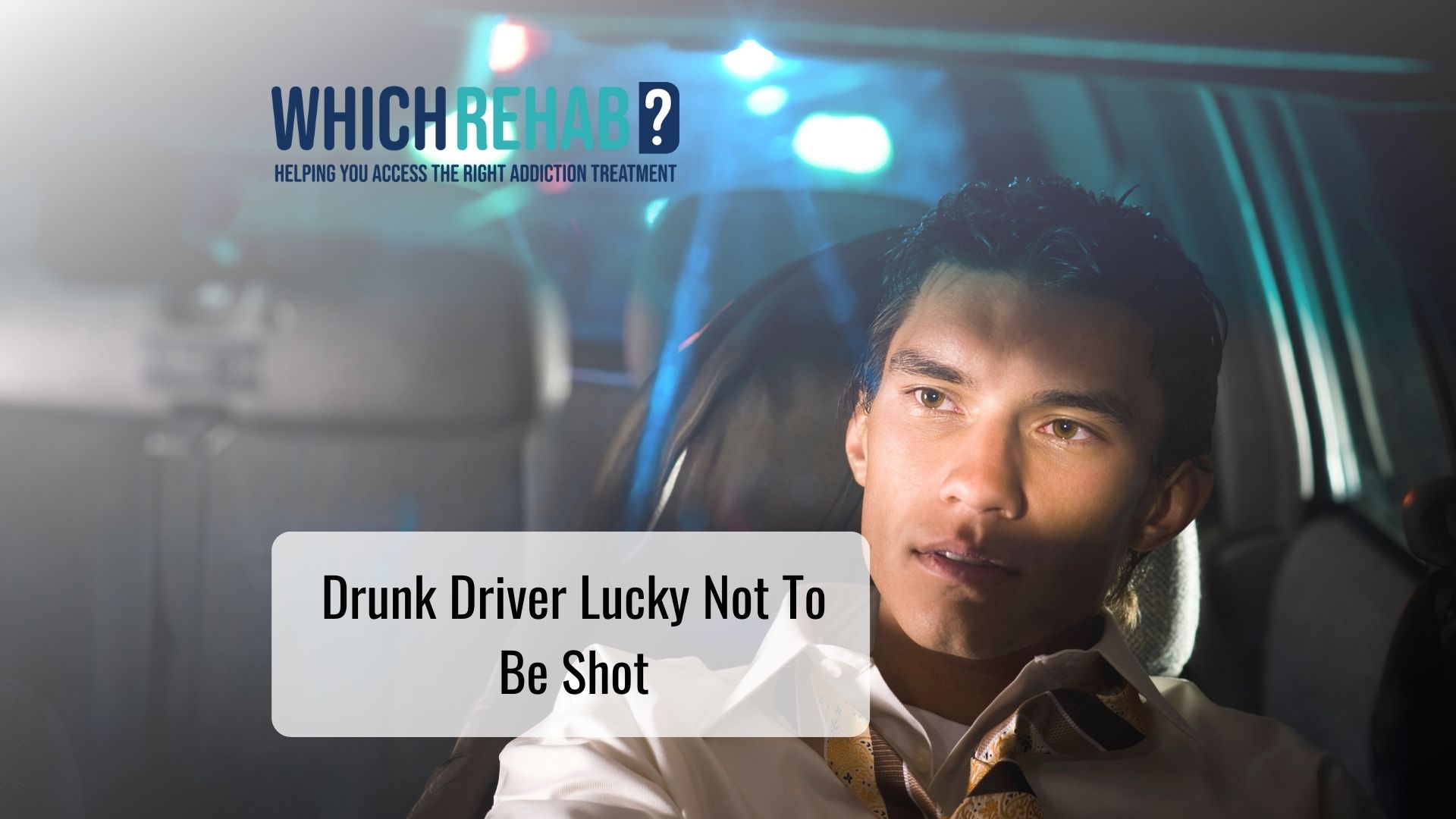 Man in car after being stopped drink driving - Which Rehab