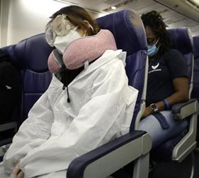 airline passenger with protective clothing