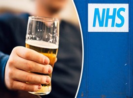person holding pint of beer with NHS sign