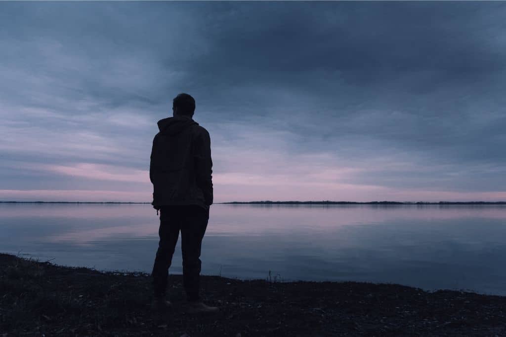 Man with mental health issues looking into distance 